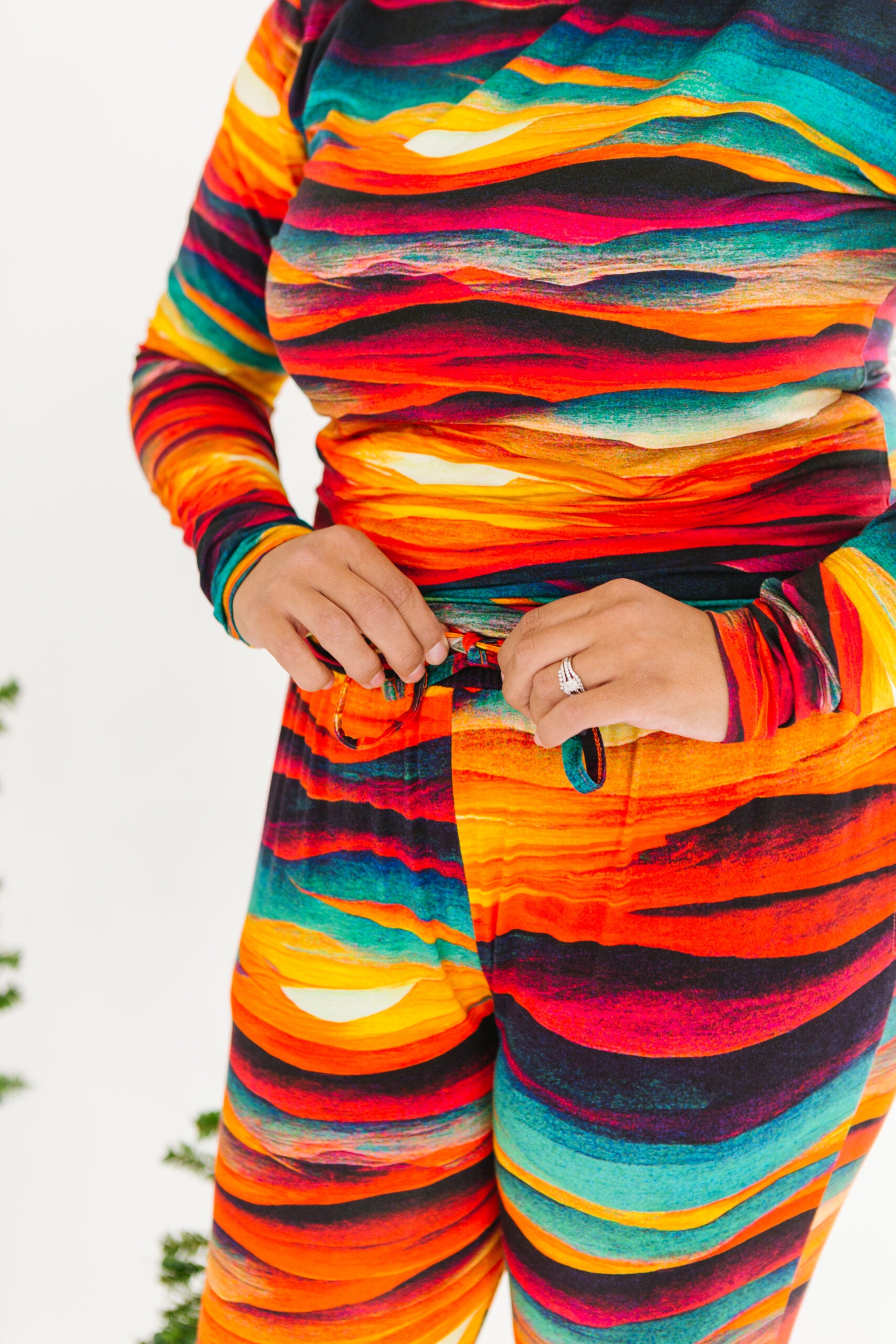 Close up of woman in sunset print lounge