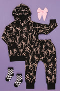 Kids bamboo jogger set in black Dancing Skelly’s skeleton print.