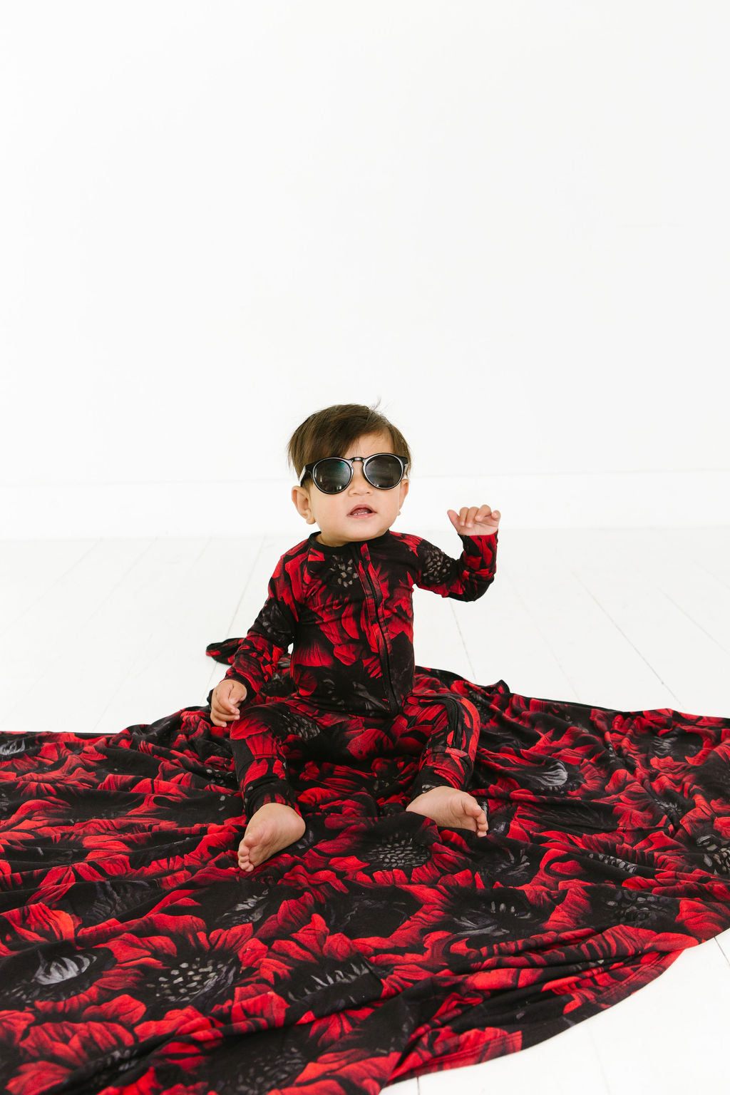 Baby wearing Redsun floral bamboo convertible romper
