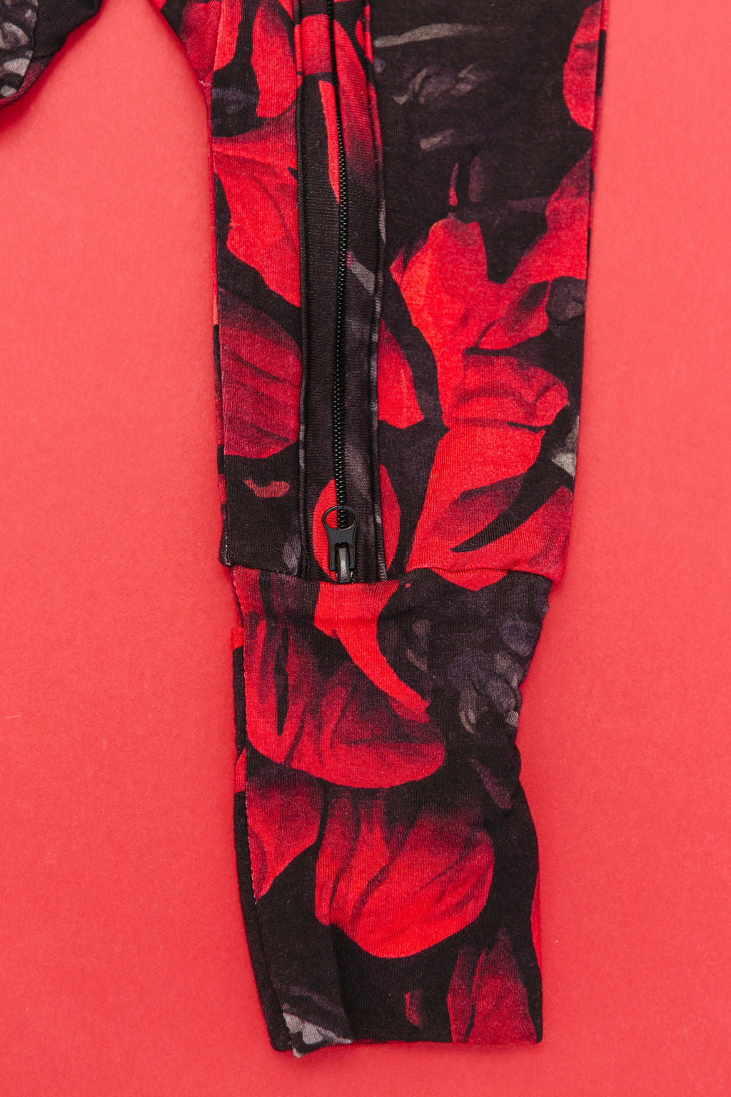 Redsun floral bamboo convertible romper flat lay, close up