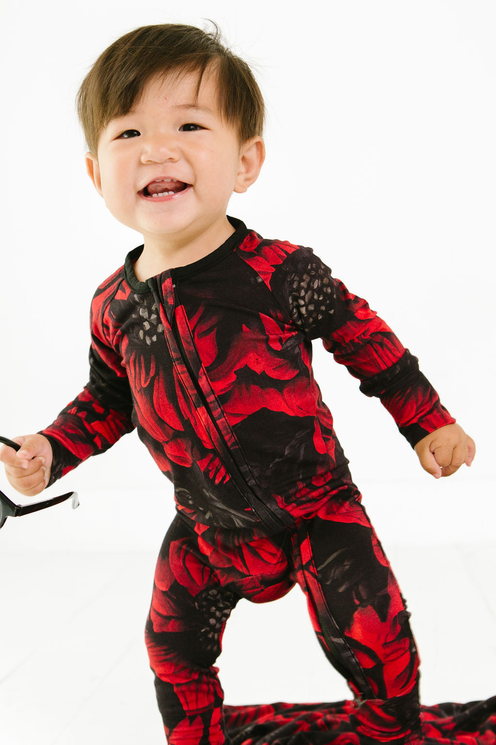 Baby wearing Redsun floral bamboo convertible romper
