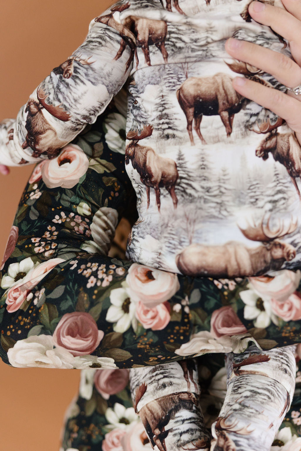 Timberline forest-print bamboo convertible romper with pine trees and winter tones