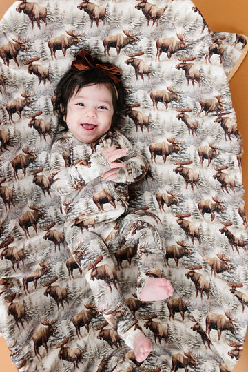 Timberline forest-print bamboo convertible romper with pine trees and winter tones