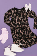 Kids bamboo twirl dress in the Dancing Skelly’s design, soft and breathable for all-day comfort